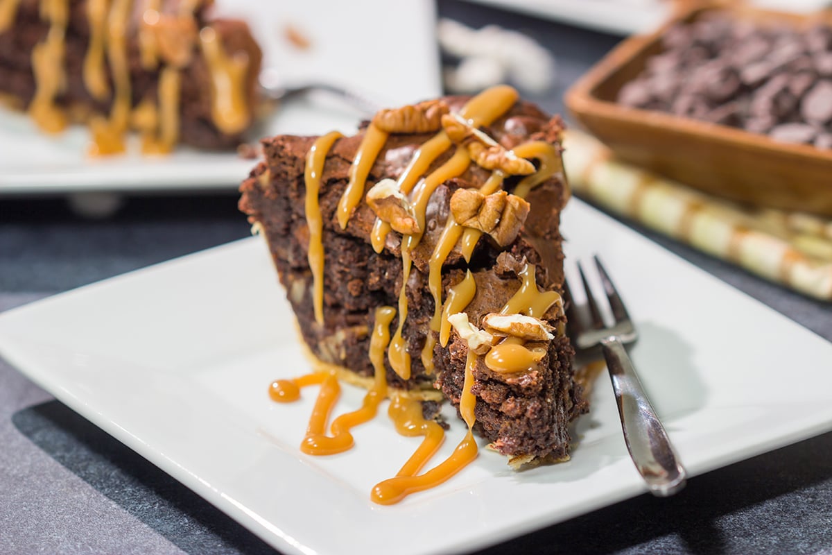 Is it a brownie? Is it a pie? It's both! This Caramel Pecan Brownie Pie is a fun mash-up of two favorite desserts. Enjoy!