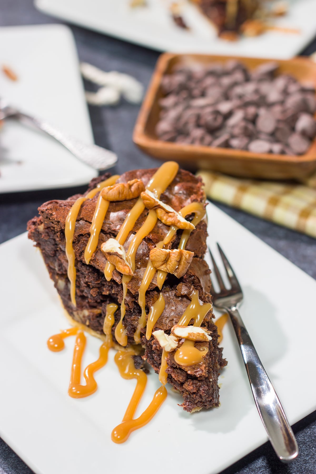 Is it a brownie? Is it a pie? It's both! This Caramel Pecan Brownie Pie is a fun mash-up of two favorite desserts. Enjoy!
