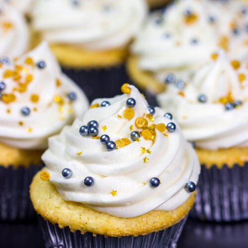 These Champagne Cupcakes feature tender vanilla cupcakes topped with creamy champagne buttercream. They're the perfect treat for New Year's Eve...or any other night of the year!