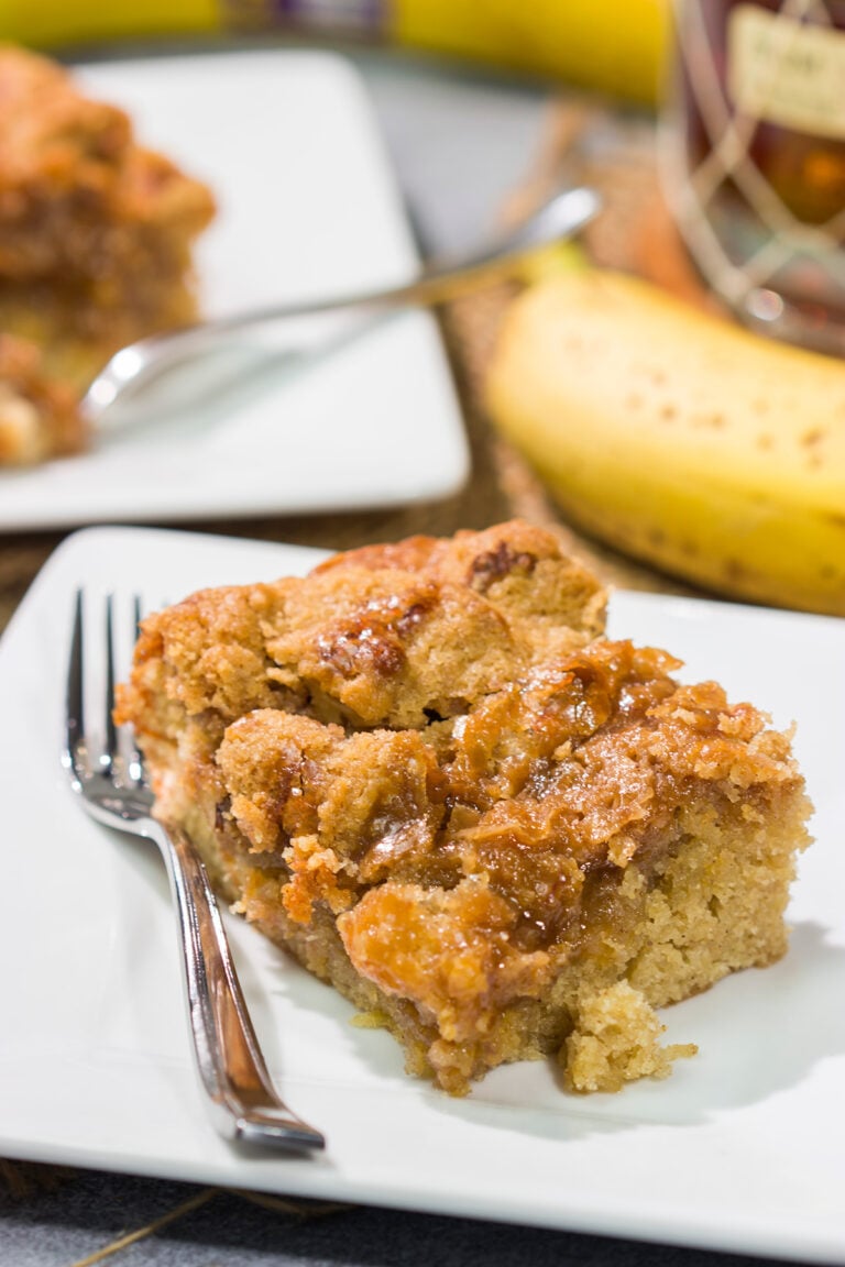 Featuring the flavors of the classic New Orleans dessert, this Bananas Foster Cake is truly fantastic! The tender cake is topped with a brown sugar streusel and rum sauce. Grab a fork!