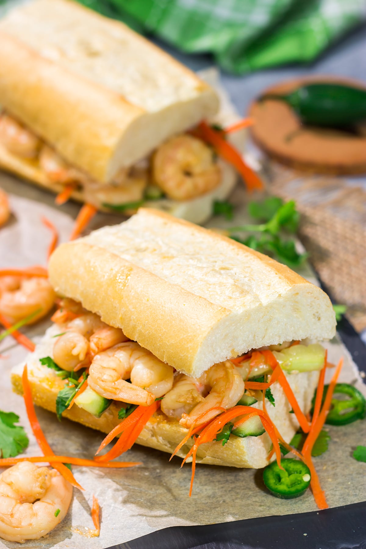 Shrimp Banh Mi is a classic Vietnamese street food...and it's surprisingly easy to make at home. Seasoned shrimp, tangy vegetables and fresh herbs combine to create a delicious sandwich!
