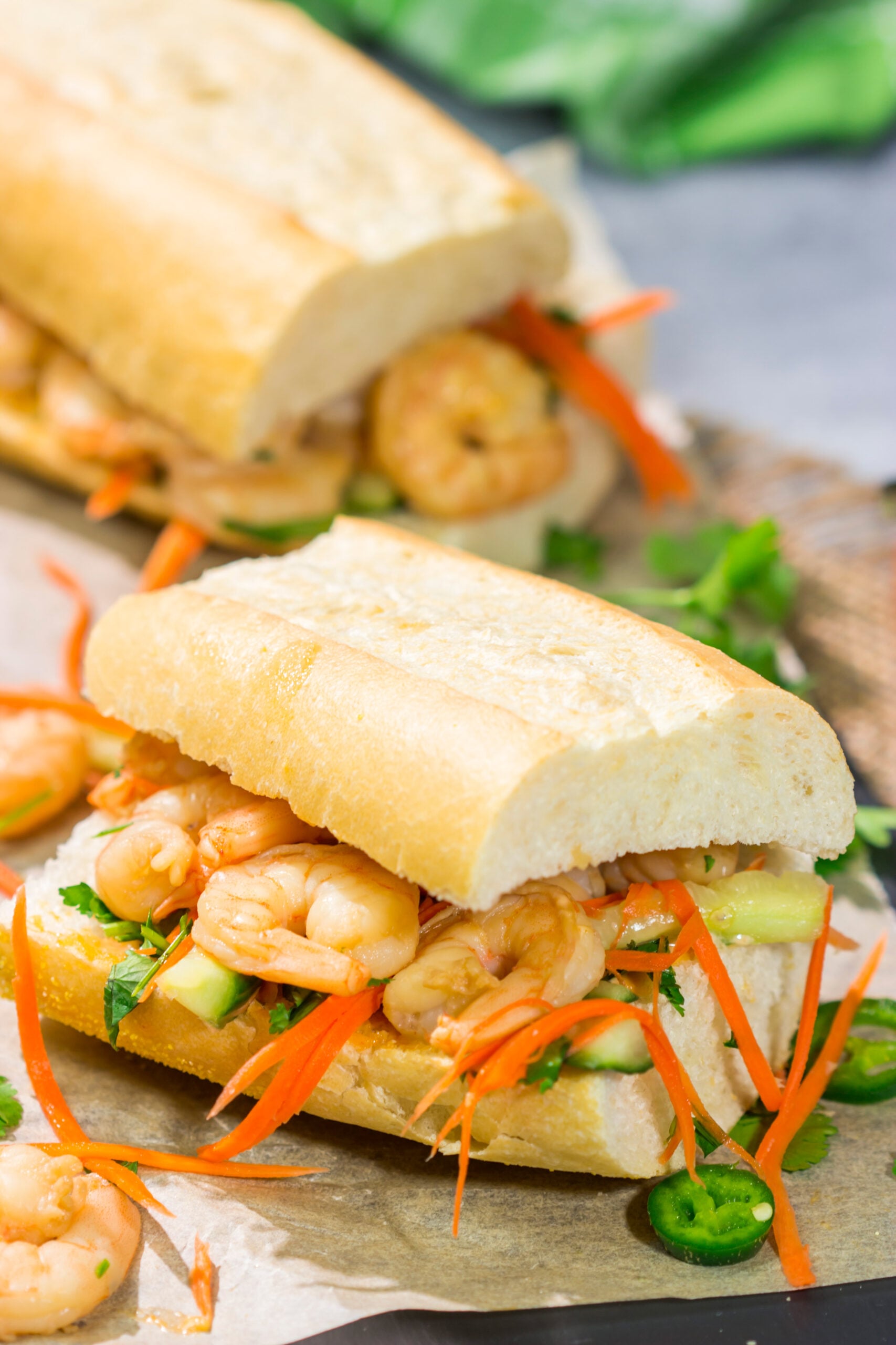 Shrimp Banh Mi is a classic Vietnamese street food...and it's surprisingly easy to make at home. Seasoned shrimp, tangy vegetables and fresh herbs combine to create a delicious sandwich!