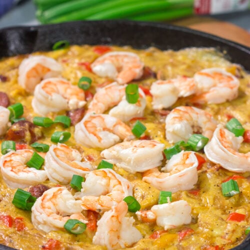 This Shrimp and Grits Casserole recipe is a fun twist on a classic. This flavor-packed casserole is the ultimate Southern comfort food!