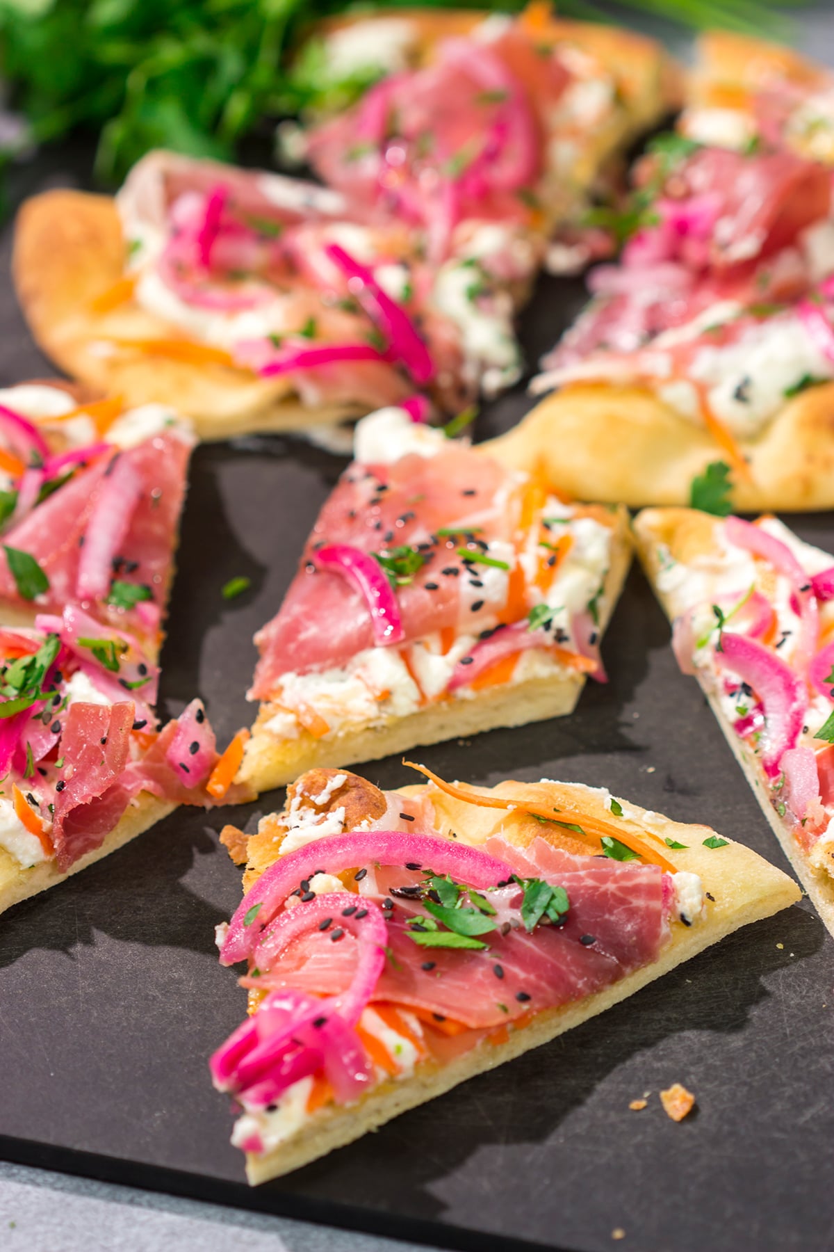 Featuring slightly crispy flatbread topped with creamy ricotta, this Whipped Ricotta Flatbread makes for an excellent summer lunch or appetizer. Cheers!
