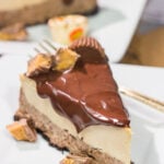 This Chocolate Peanut Butter Cheesecake features creamy layers of cheesecake topped with a decadent chocolate ganache. It's the ultimate chocolate lover's dessert!