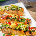 This Grilled Salmon with Corn Salsa is easy enough to make on a weeknight, but impressive enough to serve to company on a weekend. Fire up the grill for dinner tonight!
