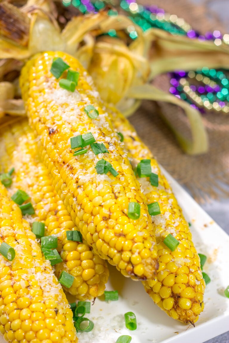 This Grilled Cajun Corn features Cajun butter rubbed on grilled corn. This makes for an excellent side dish next to juicy hamburgers or grilled hot dogs!