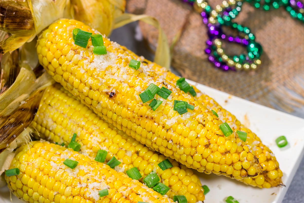 This Grilled Cajun Corn features Cajun butter rubbed on grilled corn. This makes for an excellent side dish next to juicy hamburgers or grilled hot dogs!