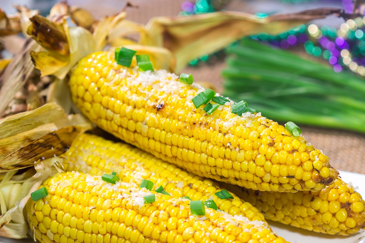 This Grilled Cajun Corn features Cajun butter rubbed on grilled corn. This makes for an excellent side dish next to juicy hamburgers or grilled hot dogs!