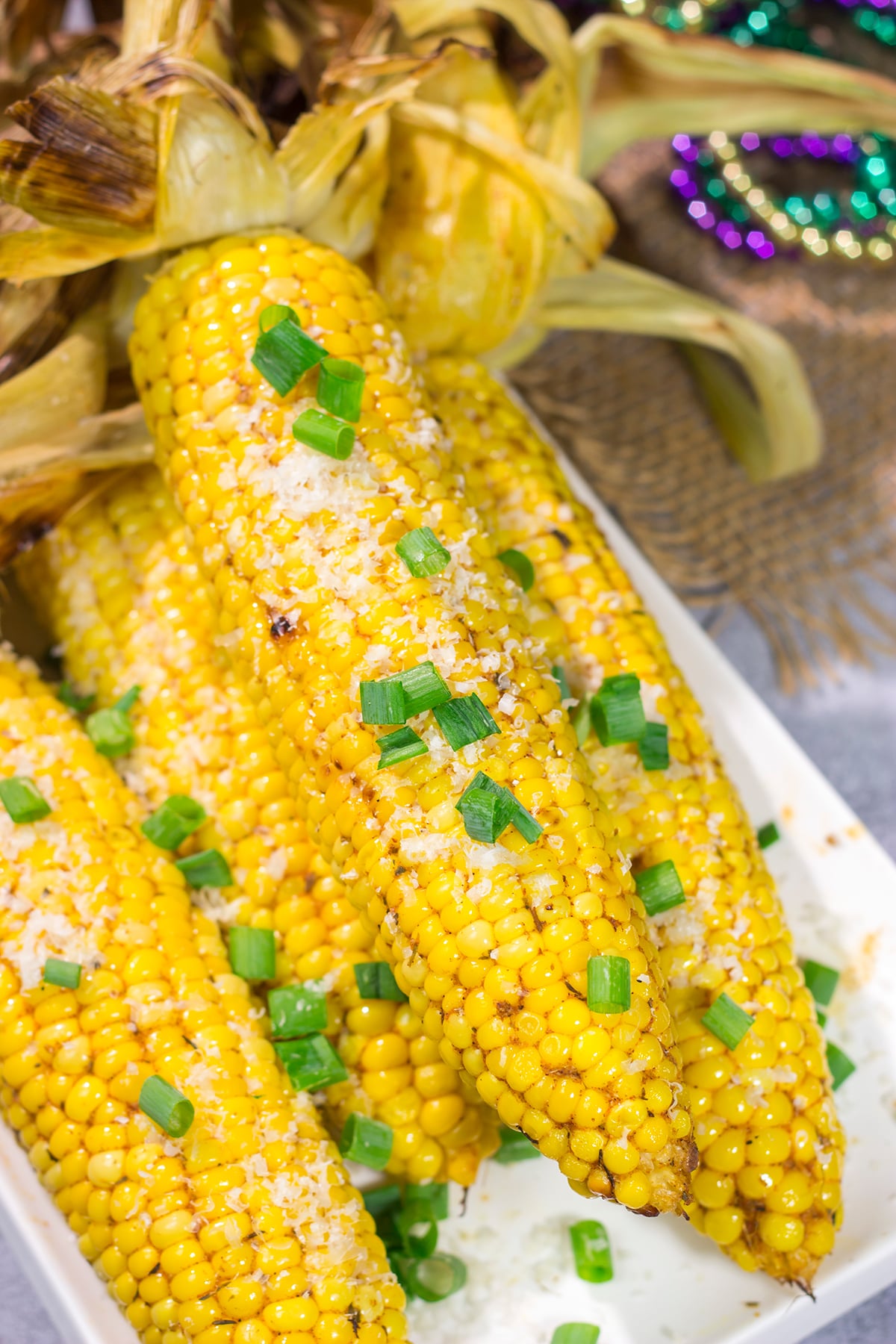 This Grilled Cajun Corn features Cajun butter rubbed on grilled corn. This makes for an excellent side dish next to juicy hamburgers or grilled hot dogs!