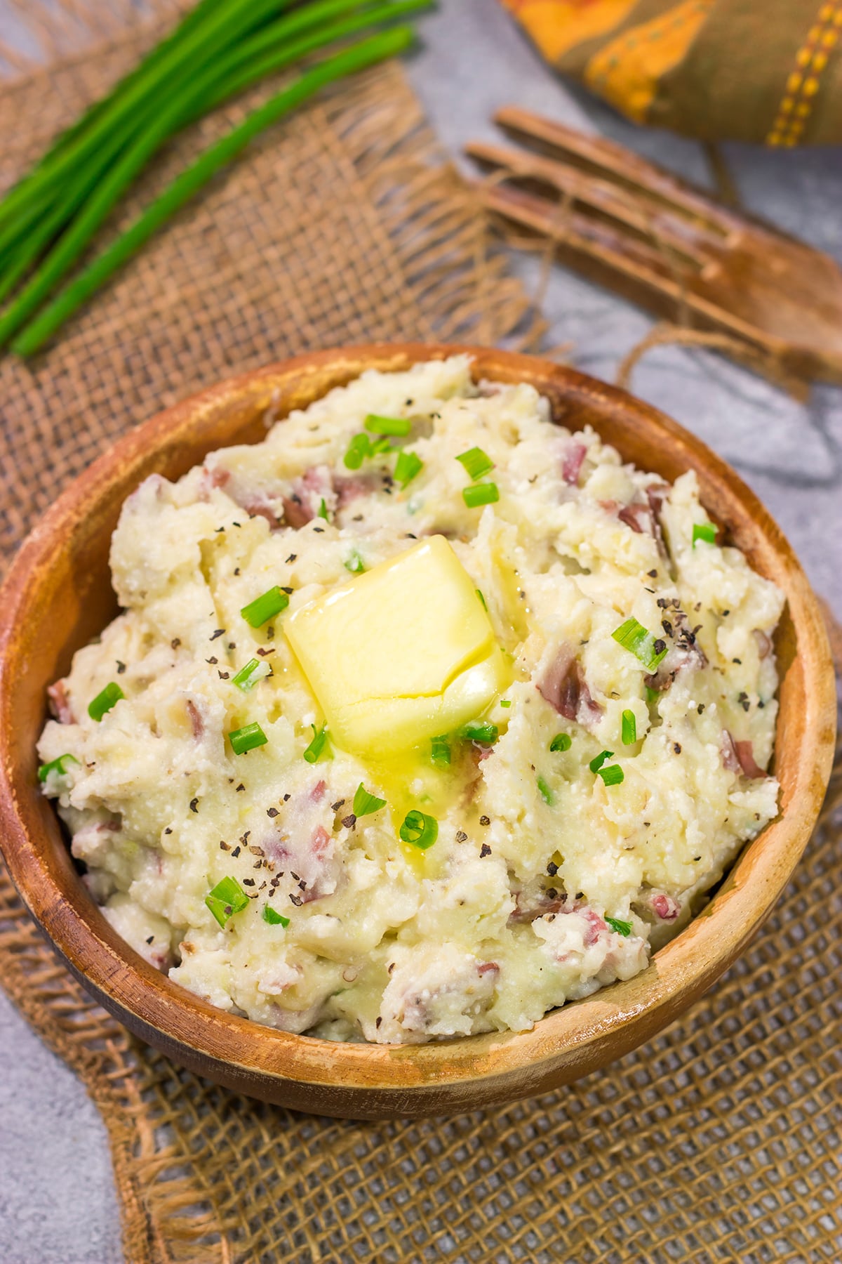 These Ricotta Mashed Potatoes are extra creamy and super flavorful. This easy side dish recipe is perfect for any occasion from weeknight meals to Thanksgiving dinners!