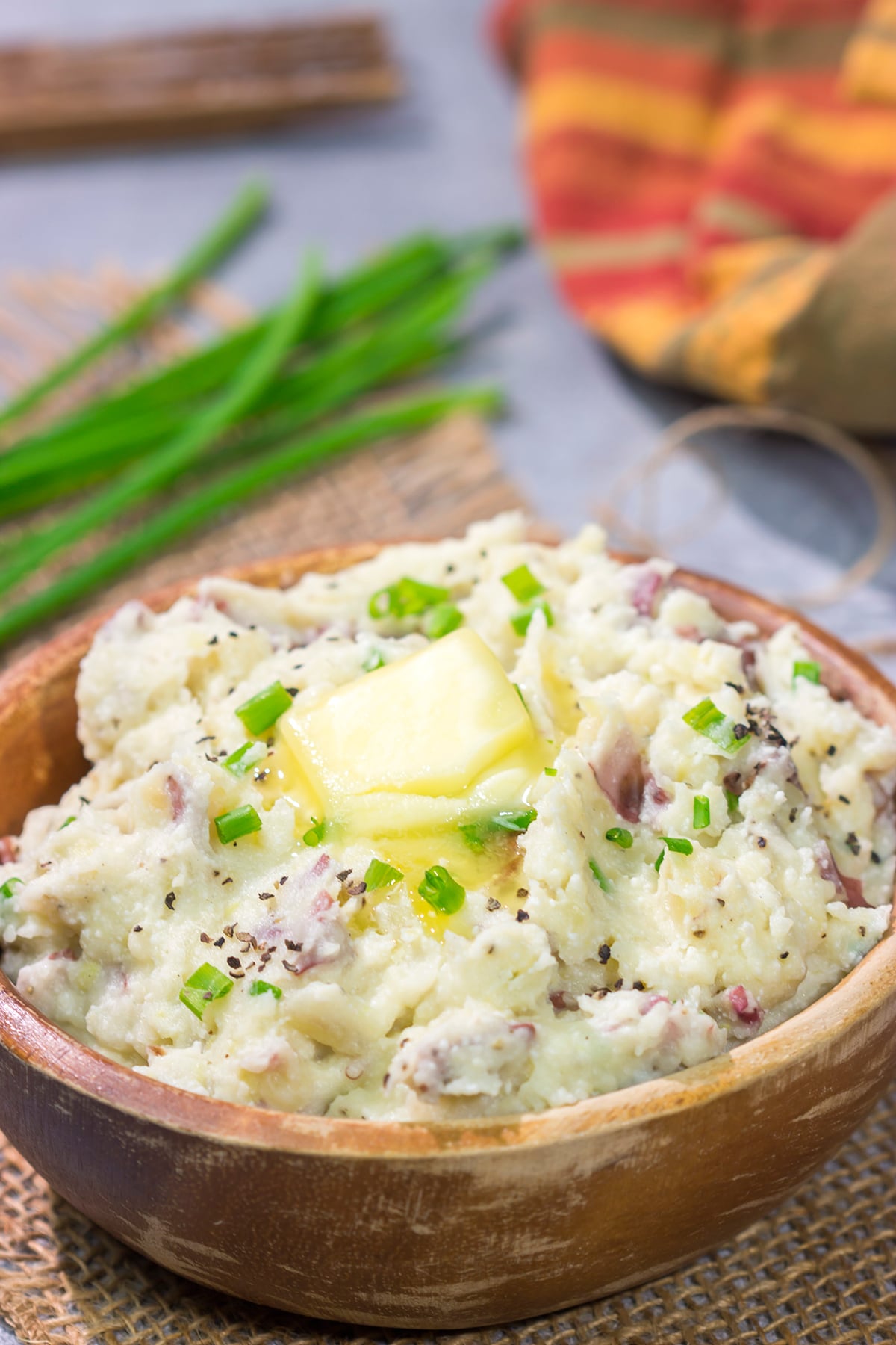 These Ricotta Mashed Potatoes are extra creamy and super flavorful. This easy side dish recipe is perfect for any occasion from weeknight meals to Thanksgiving dinners!