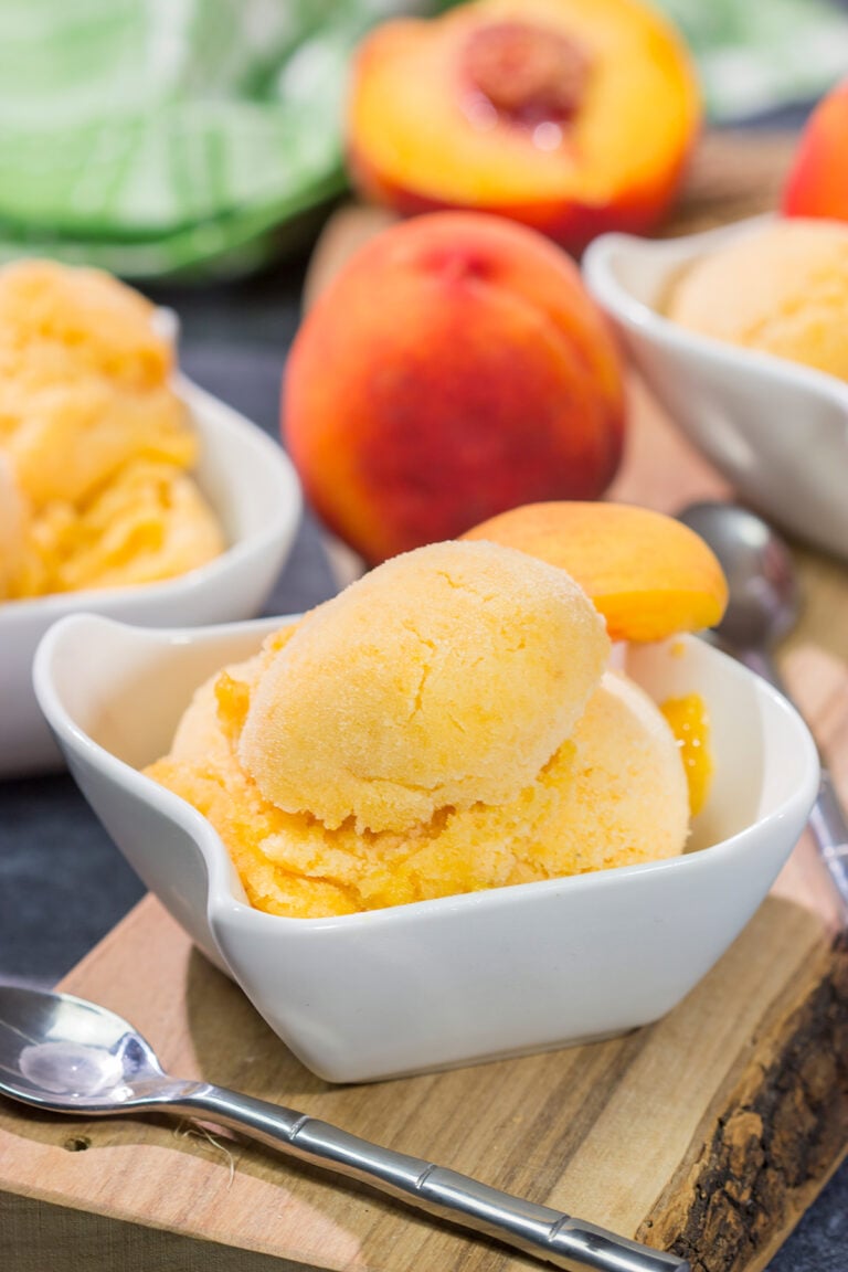 This Peach Sorbet uses only a few basic ingredients, and the result is an easy dairy-free dessert that tastes great on a hot summer day!