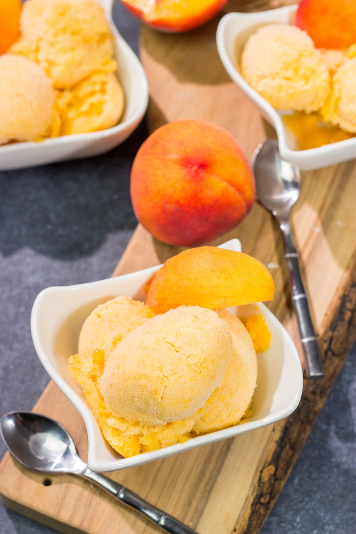 This Peach Sorbet uses only a few basic ingredients, and the result is an easy dairy-free dessert that tastes great on a hot summer day!