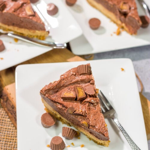 This Chocolate Peanut Butter Pie features a creamy peanut butter mousse topped with chocolate pudding...all over a thick graham cracker crust. It's an easy and delicious dessert recipe!