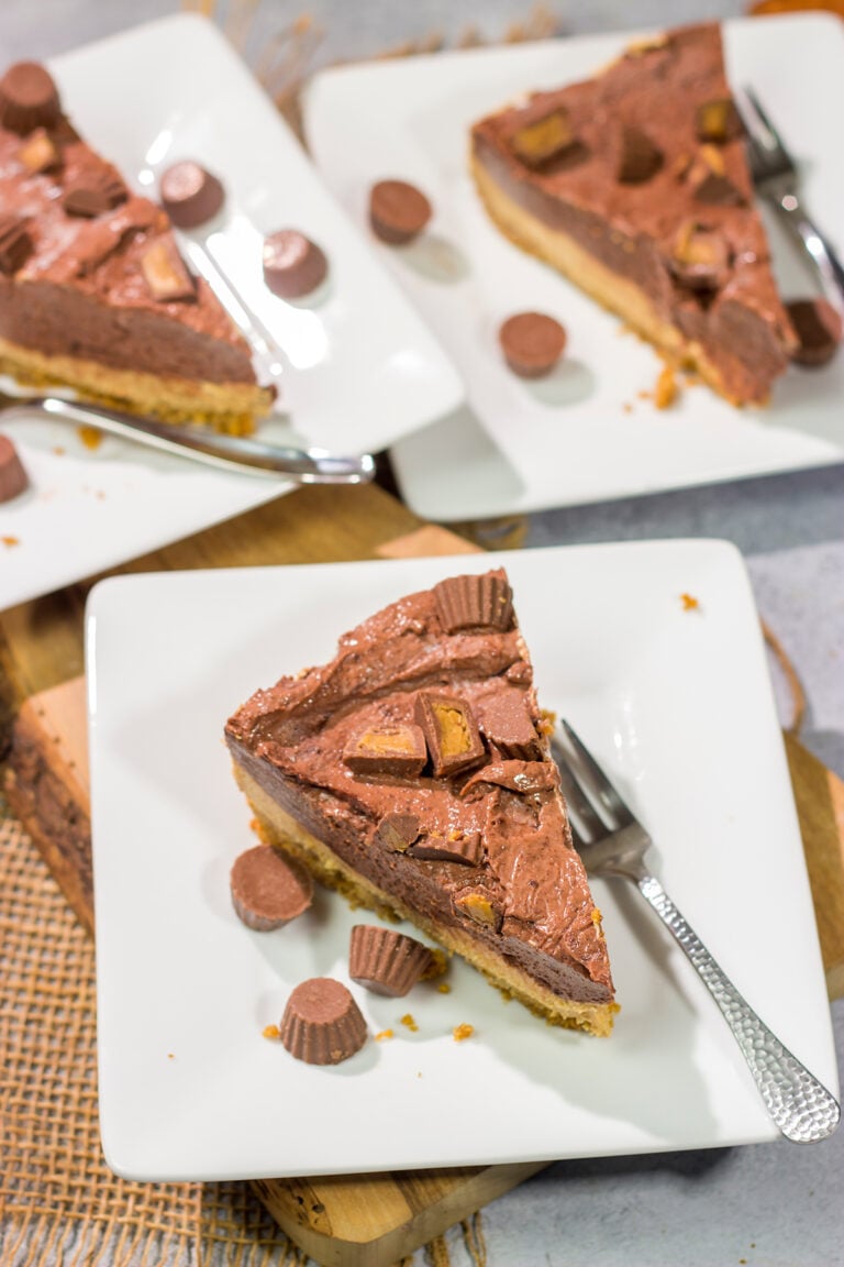 This Chocolate Peanut Butter Pie features a creamy peanut butter mousse topped with chocolate pudding...all over a thick graham cracker crust. It's an easy and delicious dessert recipe!