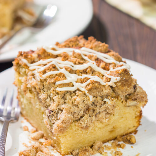 This Maple Pecan Coffee Cake features the cozy flavors of maple, cinnamon and brown sugar. A warm slice of this cake next to a cup of coffee is the perfect way to start a fall day!
