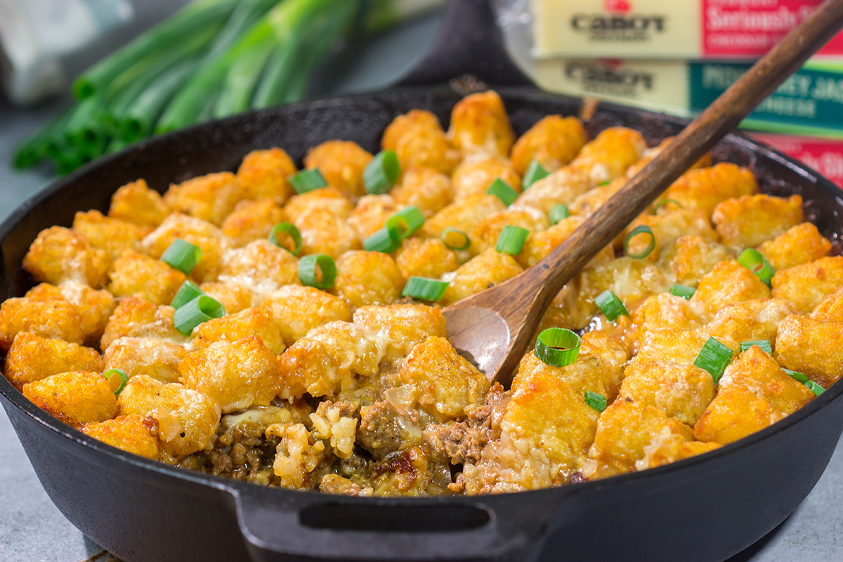 This Bacon Cheeseburger Casserole features all of the flavors of a classic burger + fries...just in casserole form! Grab a skillet and bake this for dinner tonight.