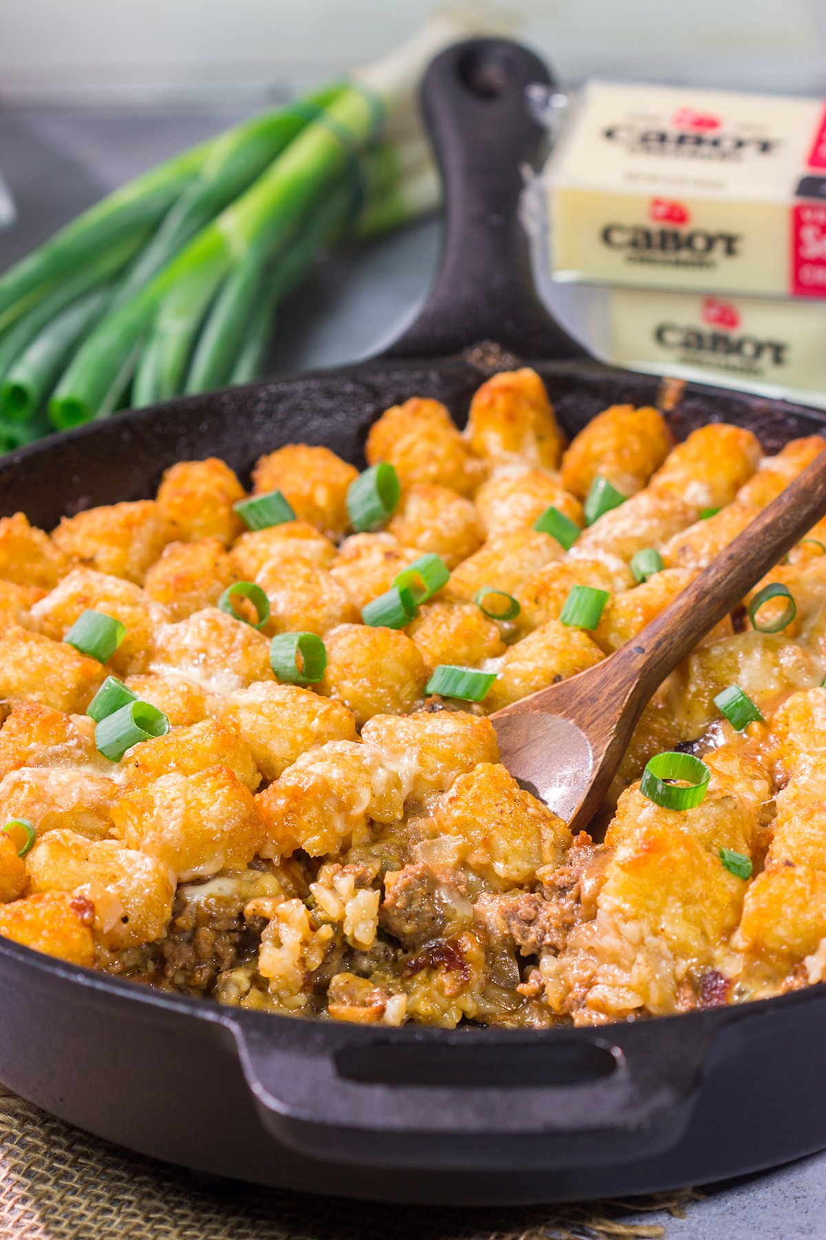 This Bacon Cheeseburger Casserole features all of the flavors of a classic burger + fries...just in casserole form! Grab a skillet and bake this for dinner tonight.