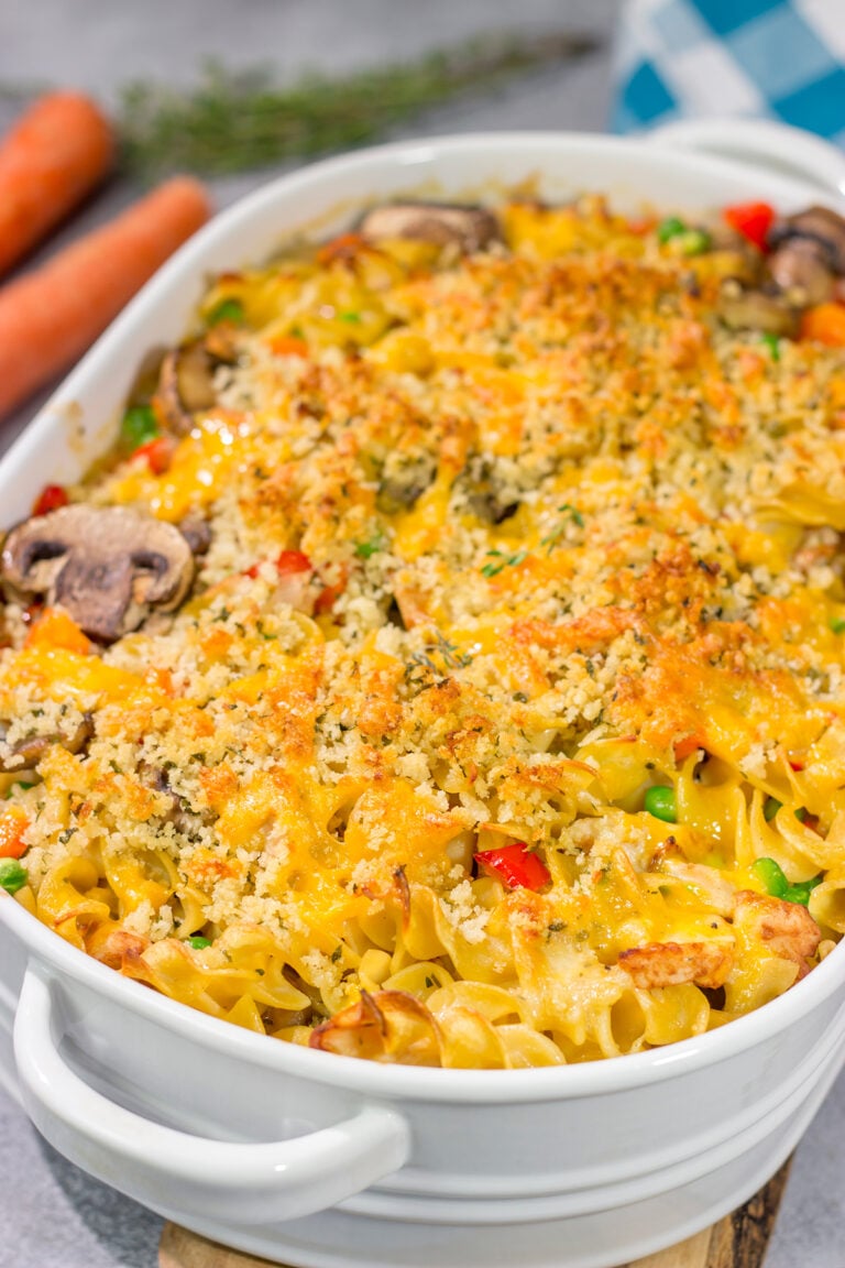 This Cheesy Chicken Noodle Casserole is creamy, comforting and packed with flavor. It's an easy meal the entire family will love!