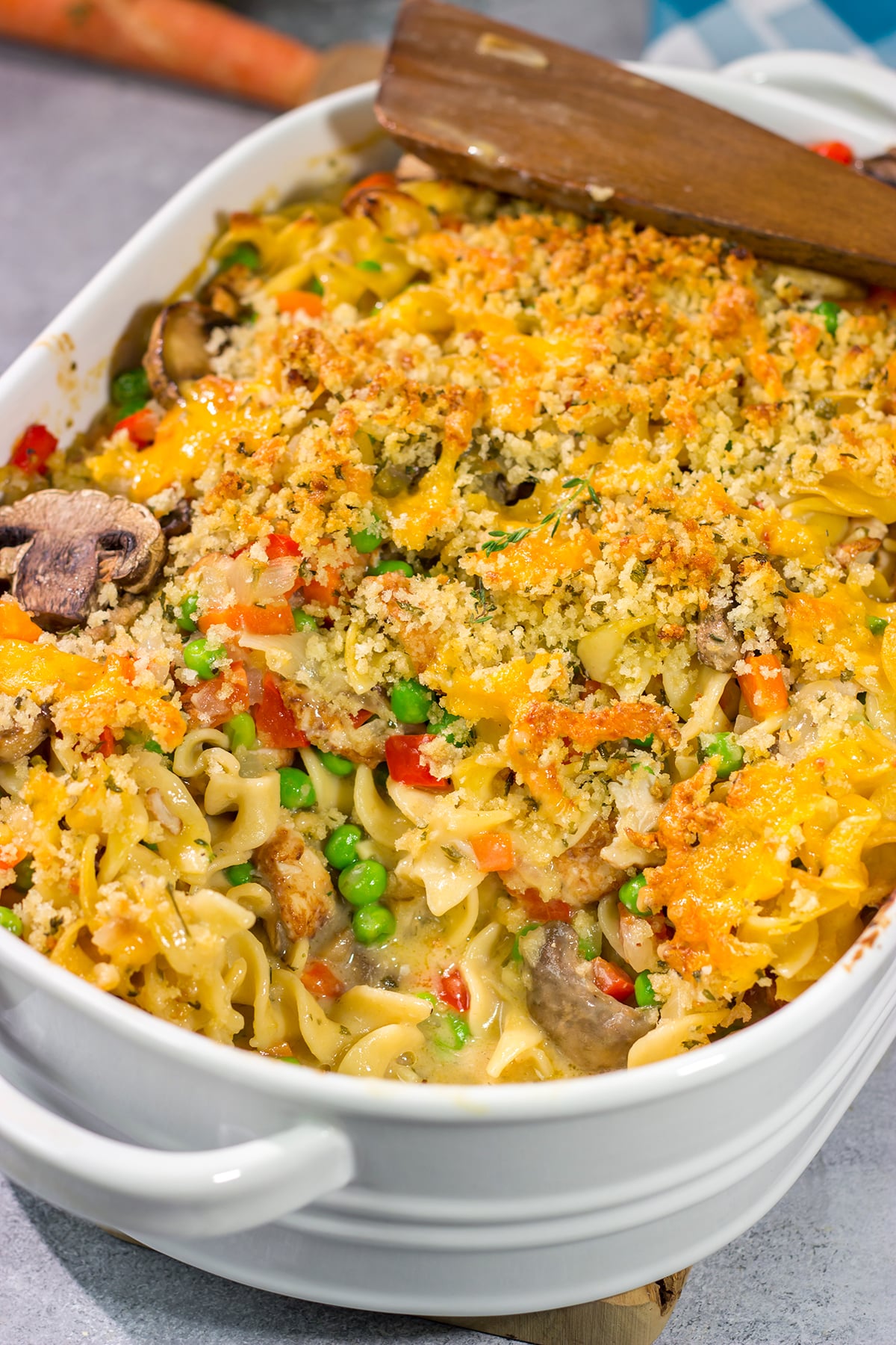 This Cheesy Chicken Noodle Casserole is creamy, comforting and packed with flavor. It's an easy meal the entire family will love!