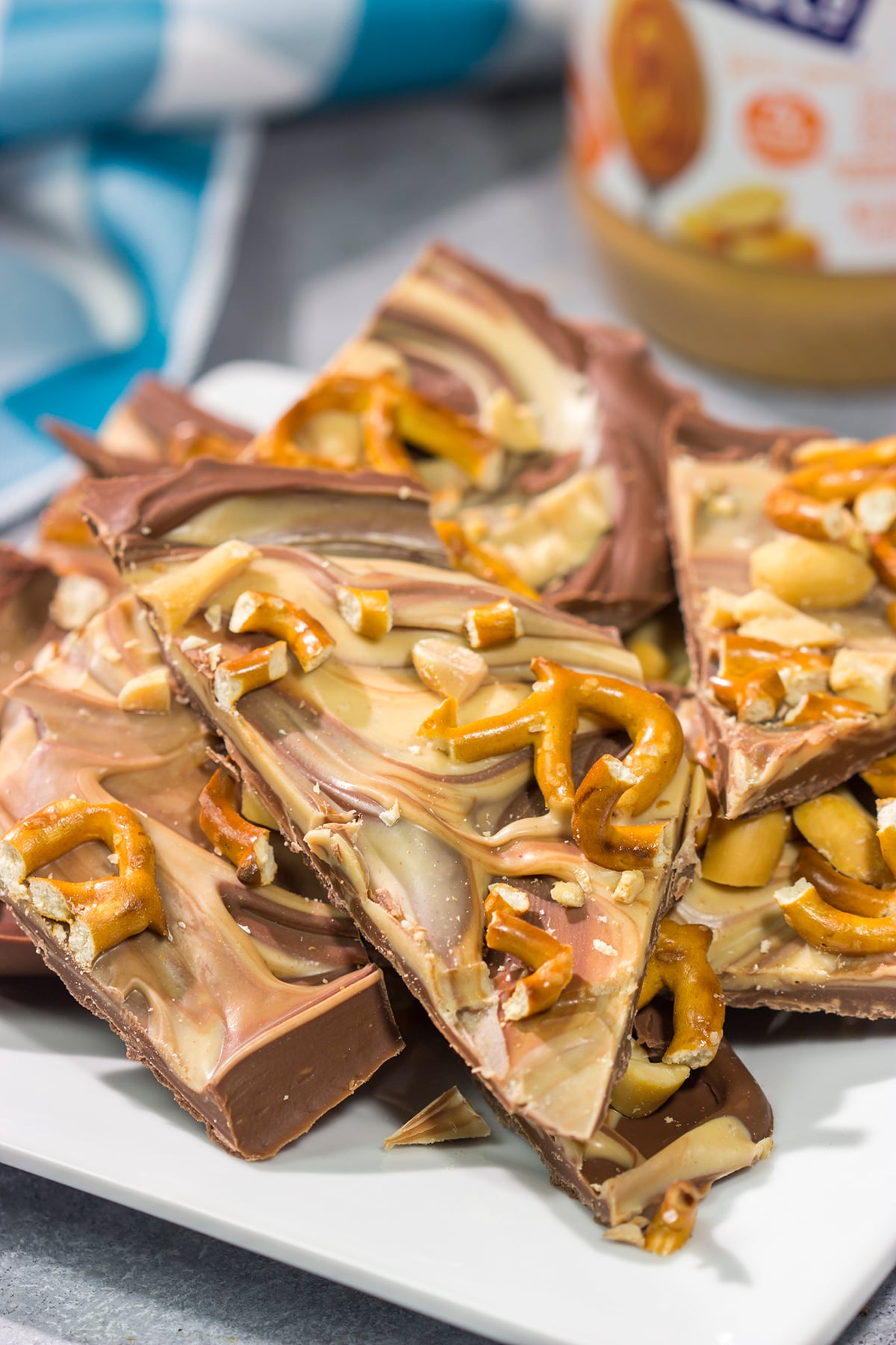 This Chocolate Peanut Butter Bark is an easy, no-bake treat that you can whip up in about 10 minutes. The layers of chocolate and peanut butter make this treat irresistible!