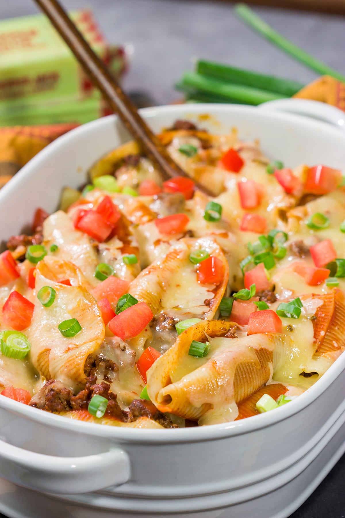 Put a spin on taco night with these Cheesy Taco Stuffed Shells! Instead of tortillas, stuff seasoned taco meat into pasta shells and top it with plenty of melty cheese for a fun family dinner.