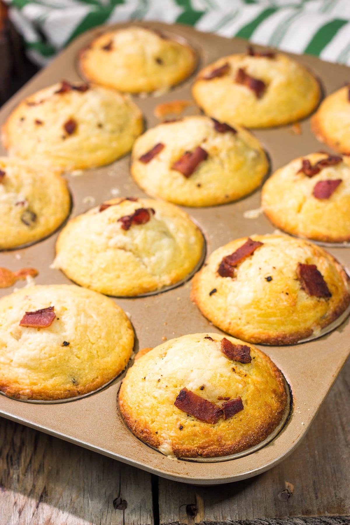 These Bacon Cheddar Cornbread Muffins are packed with crispy bacon, sharp cheddar cheese and classic cornbread flavor. They're the perfect side dish for soups and stews!